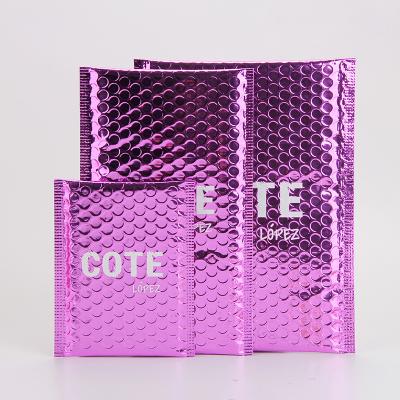 China Customized Hot Pink Metallic Bubble Mailer For Cosmetic Packaging for sale