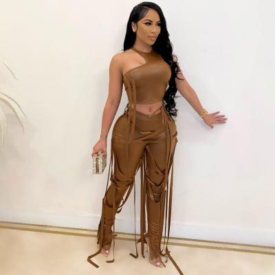 China 2021 Fashion Female Wholesale PU Crop Leather Irregular Tops And Lace Breathable Up Fringe Pants 2 Piece Set for sale