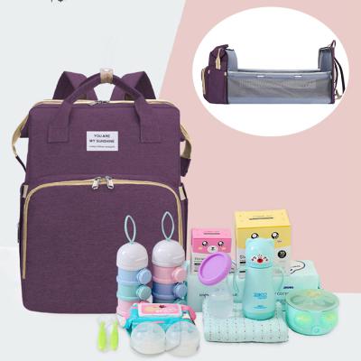 China Multifunctional Purpose Small MOQ Customized Design Diaper Backpack With Multifunctional Collapsible Baby Bed Diaper Bag for sale