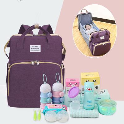 China Preferred Baby Diaper Bag Mummy Bag Diaper Cart Multifunctional Care Tote Bag SAC Bebe With Foldable Crib for sale