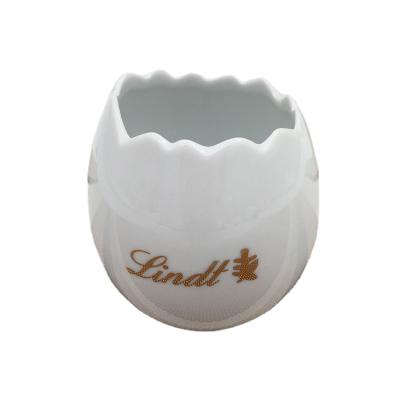 China Sustainable Fashion Egg Shaped Ceramic Pudding Cake Mold With Customized Design for sale