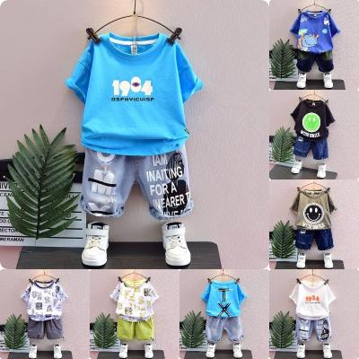 China New 2 Pieces Summer Casual High Quality Clothing Handsome Cartoon Pattern Men's and Women's Children's Clothing Sets Wholesale for sale