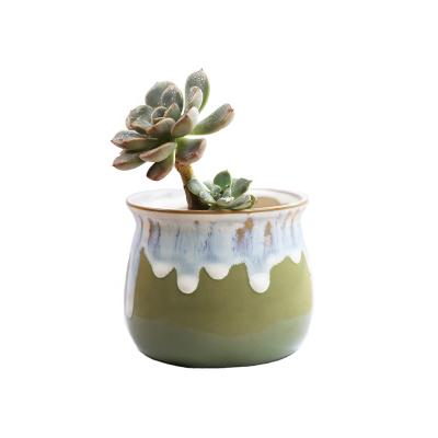 China Easily Assembled Mini Plant Ceramic Flowing Glaze Low Flower Pot Small Planter Pots With Holes for sale