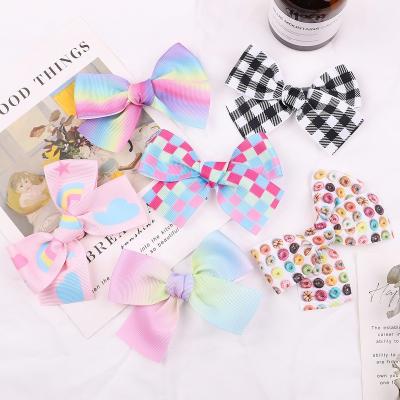 China Girl Hair Decoration MIO Korean Rainbow Printing Floral Color Bow Clip Headdress For Kids Girls Cute Baby Hair Clip Hair Accessories for sale