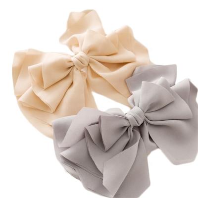 China MILLION 2022 big color korean cloth ponytail fashion hair clip women fashion design bow hair accessories for girls ladies for sale