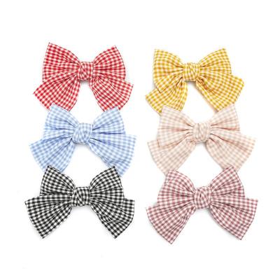 China MIO New Arrival Women High Quality Fashion Hair Clip Bow Plaid Hair Accessories Printing Fashion Bow Hair Clips for sale