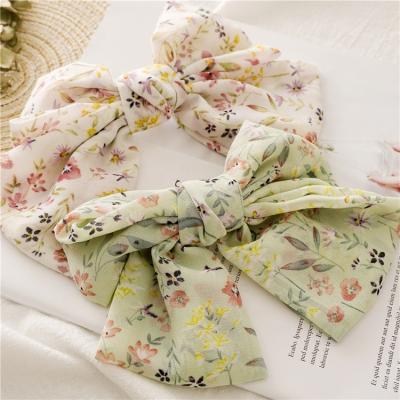 China MIO Wholesale High Quality Korean fashion bow knot floral hair clip for women hair accessories large bow barrette for sale