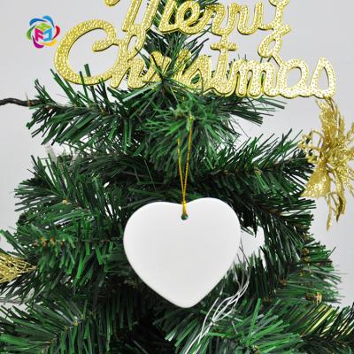 China Eco - Friendly Wholesale Ceramic White Sublimation Hanging Christmas Ornament for sale