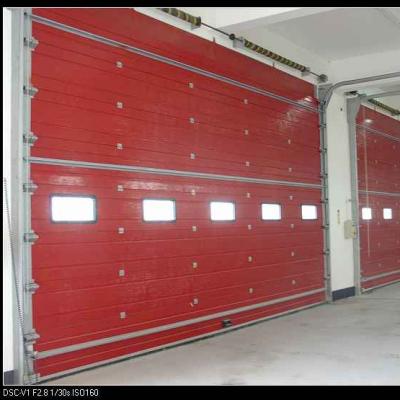 China Sound Insulation Red Color Electric Overhead Sliding Sectional Fire Doors for sale