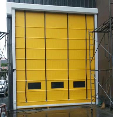 China Heat Insulation PVC Industrial Automatic High Speed ​​Fold Up Windproof Shutter Doors for sale