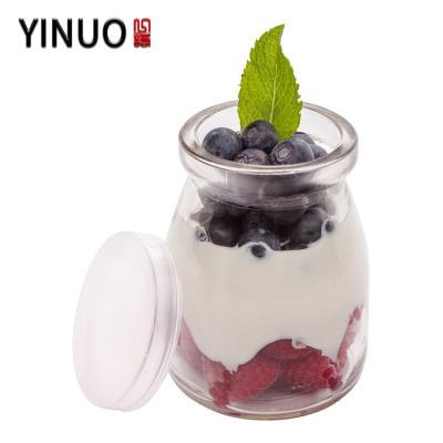 China 50ml Vintage Pudding Beverage Customized Glass Milk Bottle With Covers for sale