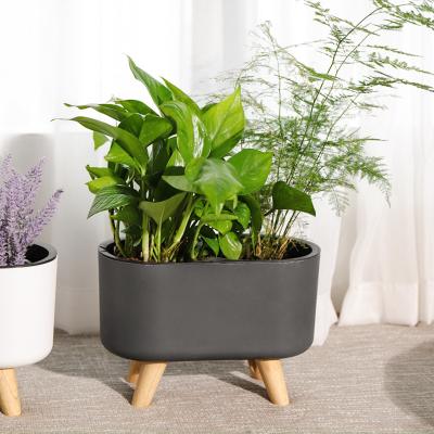 China Modern Wholesale Cheap Modern Rectangle Large Garden Plastic Self Watering Planter Flower Pots Individual Black Self Watering Flower Pot for sale