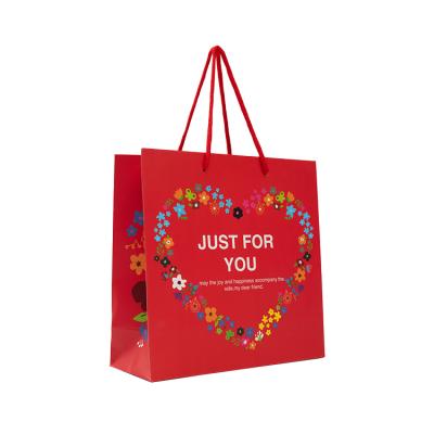 China Recyclable Paper Bags Thanksgiving Shopping Bag Luxury Kraft Paper Paper Bags With Rope Handle for sale