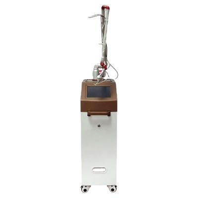 China Skin tightening rf co2 laser facial machine/facial machine for scar treatment /viginal tightening for sale