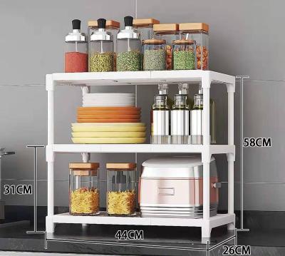 China Newest Kitchenroom Storage Rack 2023 2 Layers Multifunctional Seasoning Universal Microwave Rack Kitchen Storage Oven Shelf Rack for sale