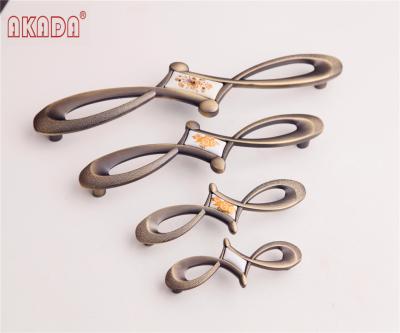 China EUROPEAN High Quality Kitchen Drawer Furniture Ceramic Zamak Handles for sale