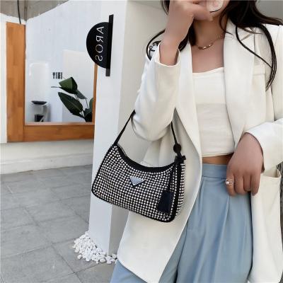 China Fashion girls underarm handbags for woman clip below young ladies fashion rivet handbags for sale