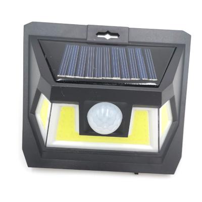 China Outdoor Garden Motion Sensor Solar Light COB LED Motion Sensor Wall Light for sale