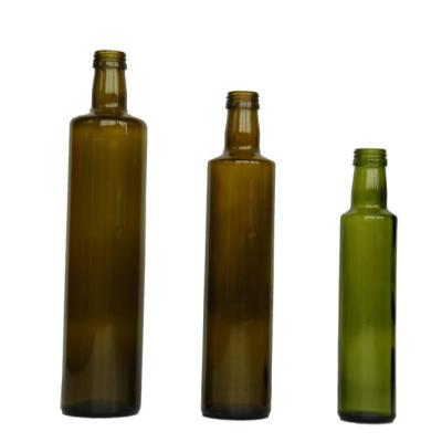 China Factory direct sale high quality dark green round glass oil bottle for sale