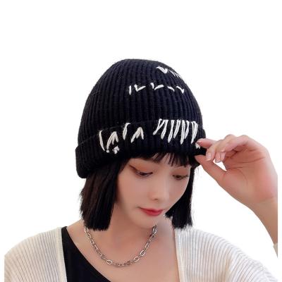 China COMMON personality knitting women's folder autumn winter satin wool knit hat spot women's hats flip elegant woolen knitted hat for sale