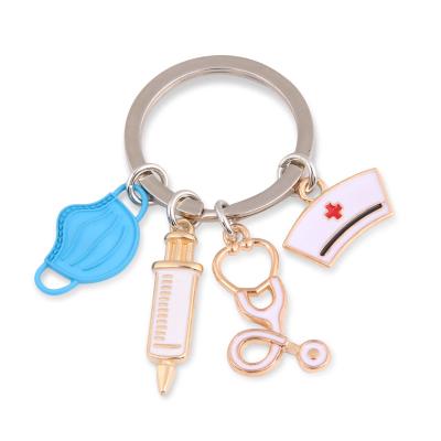 China New Modern Promotional Key Chains Doctor Hat Keychain Medical Tool Ring Injection Syringe Stethoscope Nurse Cute Key Chains for sale