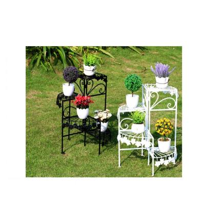 China Modern Light Luxury Adjustable Metal Iron 4 Tier Flower Plant Indoor Outdoor Stand With 4 Planter Shelf Flower Pot Holder for sale