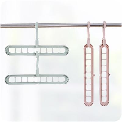 China 9-Hole Hanger Space Saving Rotatable Plastic Sustainable Magic Multicolor Organizer for sale