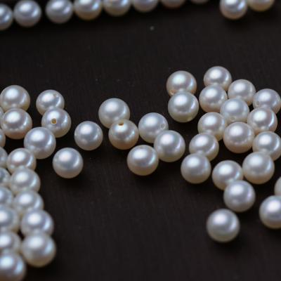 China Freshwater Pearl Natural Freshwater Pearls 5-6 Mm AAA Round Shaped Loose Pearl Beads for sale