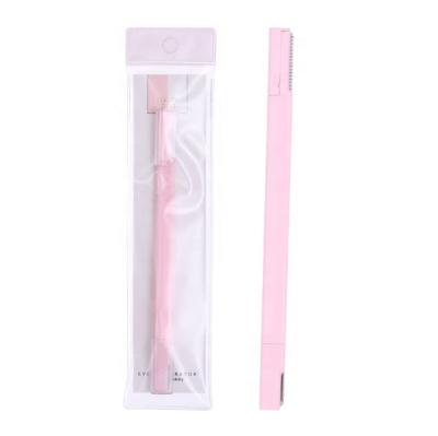 China Fashional Eyebrow Trimmer 1pcs Dermaplaning Tool Eyebrow Hair Remover Razor Shape High Quality Pink Exfoliating Trimmer for sale