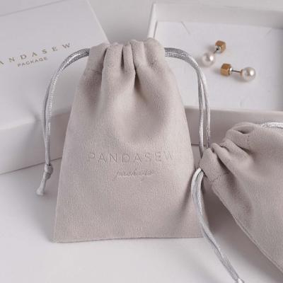 China Gift Packaging Debossed Logo Printed Suede Microfiber 9*12CM Drawstring Jewelry Pouch Bags Gray and Brown for sale