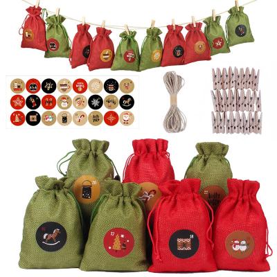 China Christmas Gift Wrapping 24 PCS 10*14CM Red Green Green Bag Set With Wooden Shelf Canvas Drawstring Bags for sale