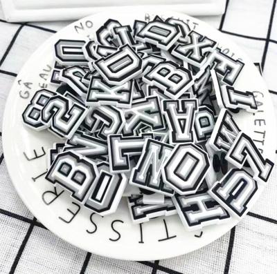 China Shoe Decoration Charms Cartoon Fashion Shoe Charms and Garden Shoe Accessories Letters Alphabet Charms for sale