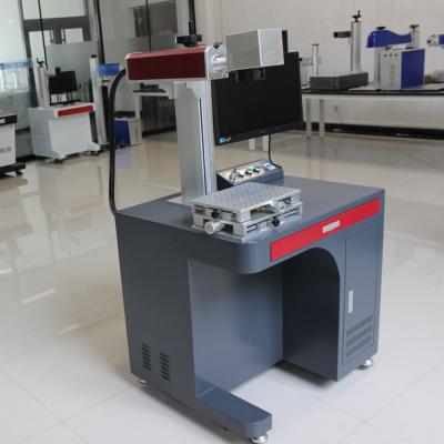 China Best Price Tianjiao CO2 Programmable Laser Marking Machine For No Metal Material for sale