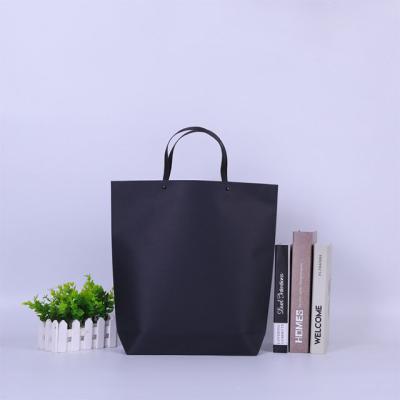 China Handmade Contracted Design Shopping Bag Gift Foldable Paper Bag With Handle for sale