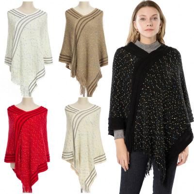 China Soft Thick Feeling Newest Selling Winter Color Fashion Stypish Pullover Bright Gold Race Tassel Knit Knitted Poncho for sale