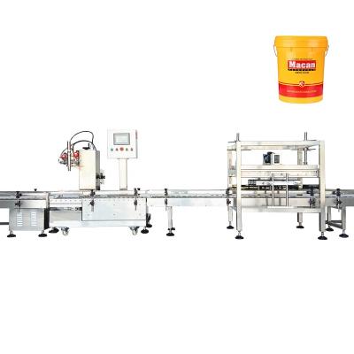 China Effortless Design Factory Price Automatic Brake Fluid Lubricating Oil Weighing Filling Machine Line For Engine Oil for sale