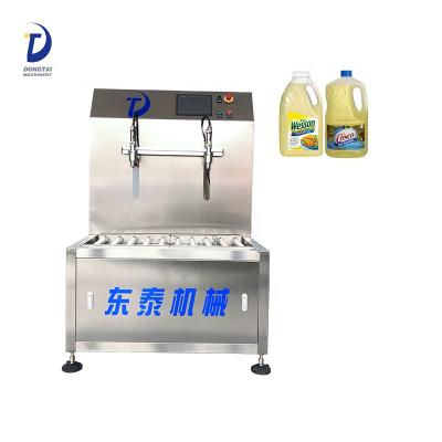 China Semi-automatic Food Oil Bottle Filling Machine Edible Oil Filling Machine for sale