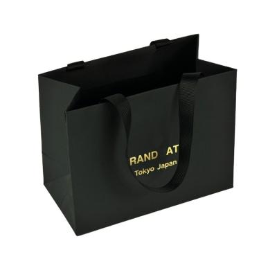 China Luxury Custom Black Reusable Reusable Foldable Materials Shopping Bag Gift Bag With Logo Print for sale