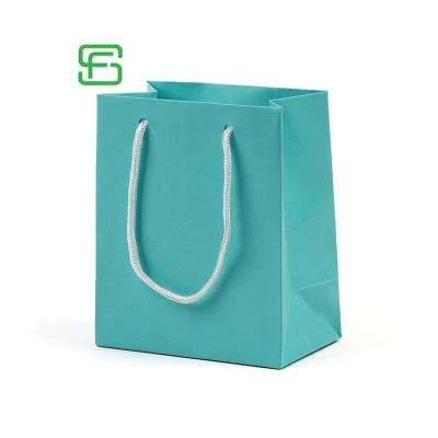 China Materials Shop Paper Shopping Bag Green Recycled Paper Bag Manufacturer Gift Shopping Paper Foldable Bag for sale