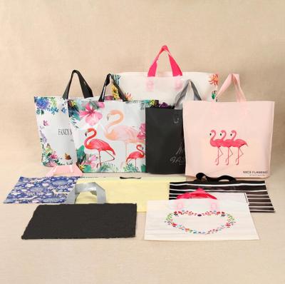 China Wholesale Recyclable Thicken Cheap Gift Bags Clothing Store EVA Plastic Shopping Bag for sale