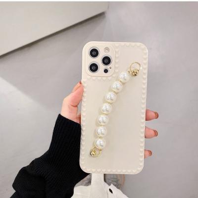 China Simple Anti-fall pearl bracelet strap to protect the phone case, suitable for iPhone 7 8 plus X XR XS 11 pro 12 max max mini for sale