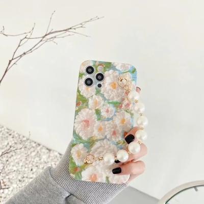 China Anti-fall pearl flower bracelet strap to protect the phone case, suitable for iPhone 7 8 plus X XR XS 11 pro 12 max max mini for sale