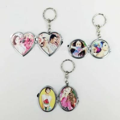 China Pocket Mirror Sublimation Double Side Metal Make Up Mirror With Key Chain for sale