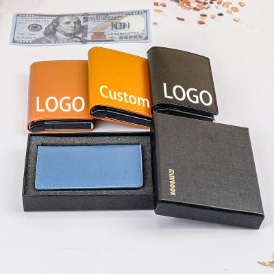 China OEM/ODM Custom Logo Business Credit Card Holder with RFID Blocking and Pop Up Design for sale