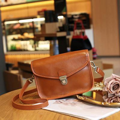 China 2024 Genuine Leather Shoulder Crossbody Bag with Polyester Lining and Large Capacity for sale