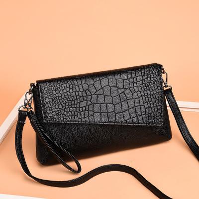 China 2023 Crocodile Pattern PU Leather Handbag Fashion Cover Envelope Clutch Bag for Women for sale