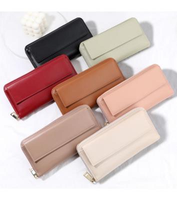 China PU Leather Credit Card Holder with Zipper and Phone Holder Wallet Pattern Type Others for sale