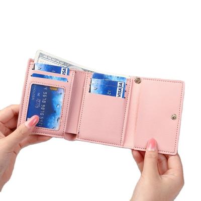 China Dames Wallet Kort Creatief Mode Wallet Meisjes Kort Kleine Mini PU Ledermunttas Te koop