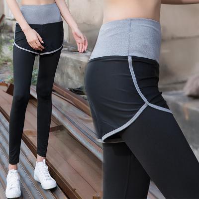 China Antibacterial Fake Yoga Women's Two High Waist Tights Fast Drying Pants Summer Fitness Elastic Running Gaiters for sale