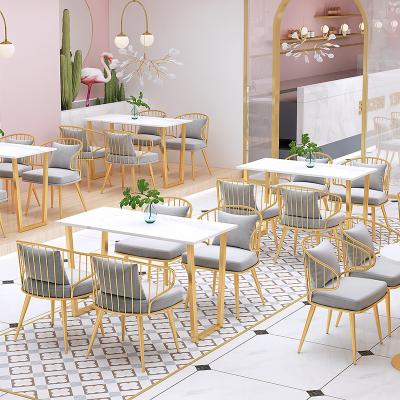 China Modern Nordic Cafe Leisure Restaurant Snack Bar Restaurant Western Dining Furniture Set Marble Iron Negotiation Table Chair Set for sale